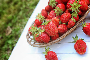 Strawberry on wicker bag outdoor