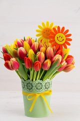 A colorful spring greetings card with tulips for Easter, Mother's Day.