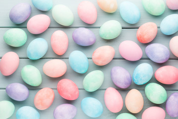Pastel Easter eggs background. Spring greating card.