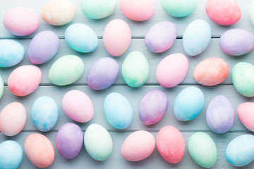 Pastel Easter eggs background. Spring greating card.