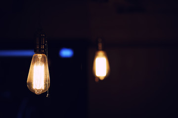 Lamps with tungsten filament. Edison's light bulb. Filament fila