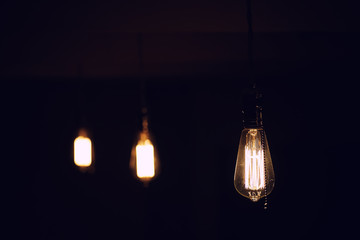 Lamps with tungsten filament. Edison's light bulb. Filament fila