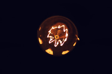 Lamps with tungsten filament. Edison's light bulb. Filament fila