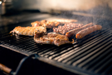 Grilled meat on barbecue