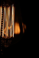 Lamps with tungsten filament. Edison's light bulb. Filament fila