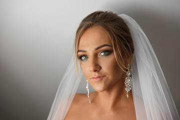 Beautiful bride. Portrait of bride with luxury wedding make-up and hairstyle. Marriage concept