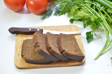 Fototapeta na wymiar cut Bread and freash vegatable on white background