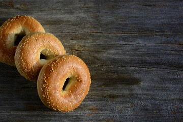 Freshly baked homemade bagels with  sesame seed and poppy seed 