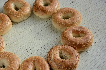 Freshly baked homemade bagels with  sesame seed and poppy seed 