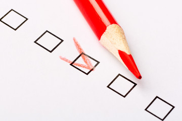Checkboxes questionnaire with red pencil. Marketing and customer service concept.