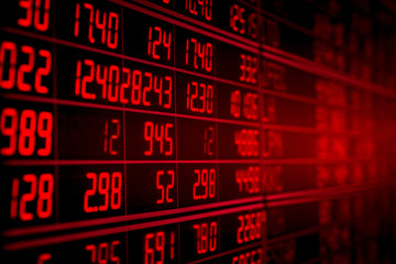 Display of red electronic board of stock market quotes. down trend or recession concept
