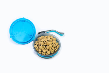 Flat lay bowl with dry food for dog or cat on isolated white.