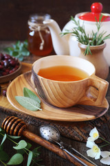 Healthy herbal tea with medicinal herbs, dog rose and honey