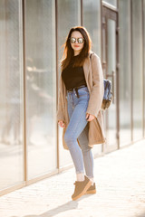 Obraz premium Happy young woman with shopping bags