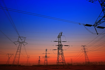 Fototapeta premium Sunset silhouette of pylon