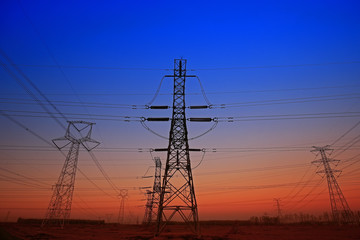 Sunset silhouette of pylon