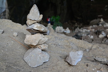 The stones are placed over the mouth of the cave