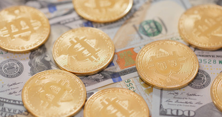Stack of USD and bitcoin