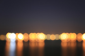 Orange bokeh of the coast,Abstract background blurred.