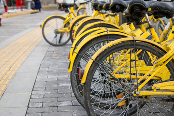 Yellow bike on public roads in the winter