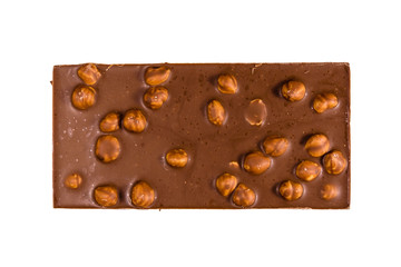 Dark chocolate with hazelnuts isolated on a white background