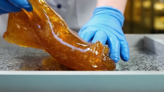 Manufacture of caramel candies stirring caramel