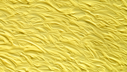 Texture of gold color with a pattern of strips and circles. Background yellow and brown painted in retro style for different purposes.