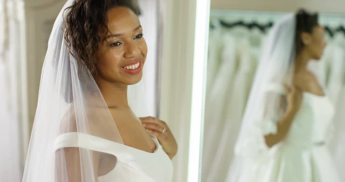 4k, Portrait of beautiful bride wearing classic white dress and bridal veil. Slow motion.
