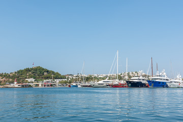 Fototapeta na wymiar Marine with luxury yachts and sail yachts in Bodrum