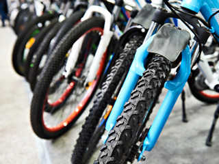 Modern mountain bikes in sports shop