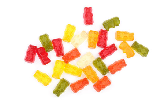 Colorful eat gummy bears jelly candy Isolated on white background. Top view. Flat lay