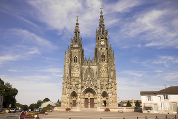 The Basilique Notre-Dame de l'Épine (Basilica of Our Lady of the Thorn), a Roman Catholic basilica in the small village of L'Épine, Marne, France, built in Flamboyant Gothic style - obrazy, fototapety, plakaty