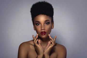 Young African model with a beautiful makeup