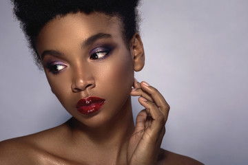 Young African model with a beautiful makeup