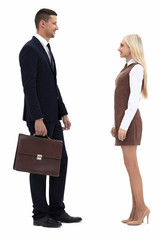 photo in full growth. friendly businessman and a young woman assistant