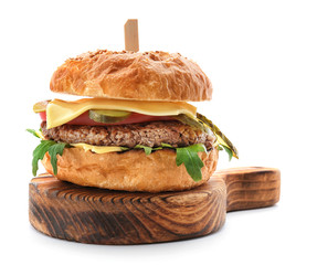 Wooden board with tasty burger on white background - obrazy, fototapety, plakaty