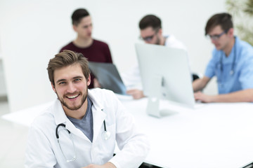 Fototapeta premium doctor looking at camera and smiling