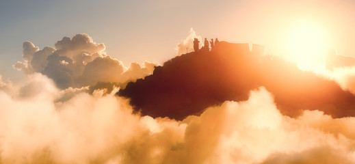 people enjoying the sunset on the top of the mountain.