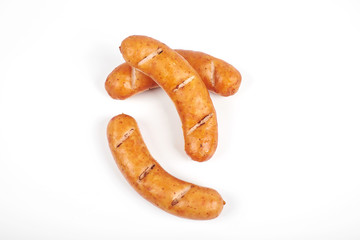 Grilled sausages isolated on a white background