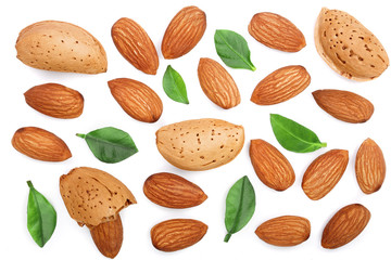 almonds with leaves isolated on white background. Top view. Flat lay pattern