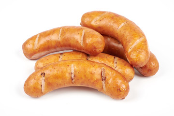 Grilled sausages isolated on a white background
