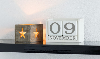 White block calendar present date 9 and month November