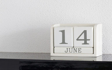 White block calendar present date 14 and month June