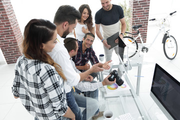 photographer and colleagues discussing the color palette