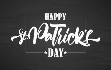Vector illustration: Hand drawn calligraphic brush type lettering of Happy St. Patrick's Day on chalkboard background.