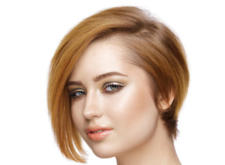 Fototapeta premium Beautiful young woman with straight short hair isolated on white