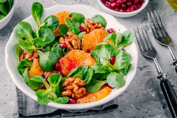 Green Lamb’s lettuce corn salad with blood oranges, walnuts, pomegranate and chia seeds