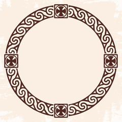 Celtic national circle ornament as interlaced ribbon with crosses. Old beige background with the aging effect.