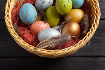 Happy easter! Easter eggs on wooden background