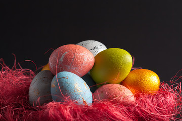 Happy easter! Easter eggs on wooden background
